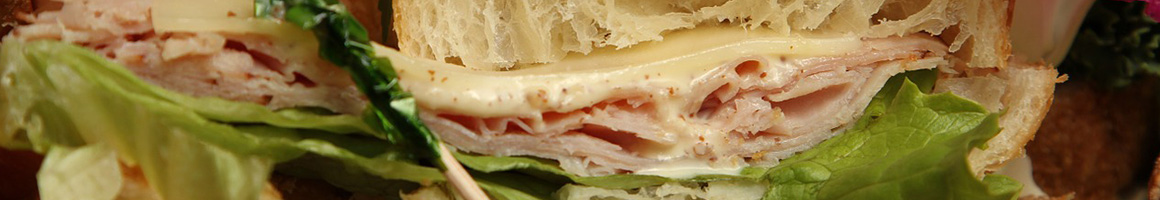Eating Deli Sandwich at The Bakery Station restaurant in Salinas, CA.